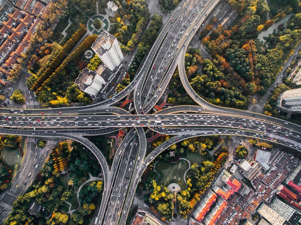 Services: Aerial view of a multi-level highway interchange directing traffic in many directions