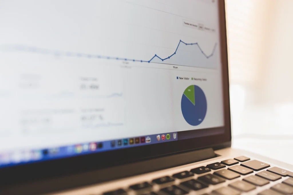 Setup: Close-up of a laptop screen with a traffic line graph and pie chart
