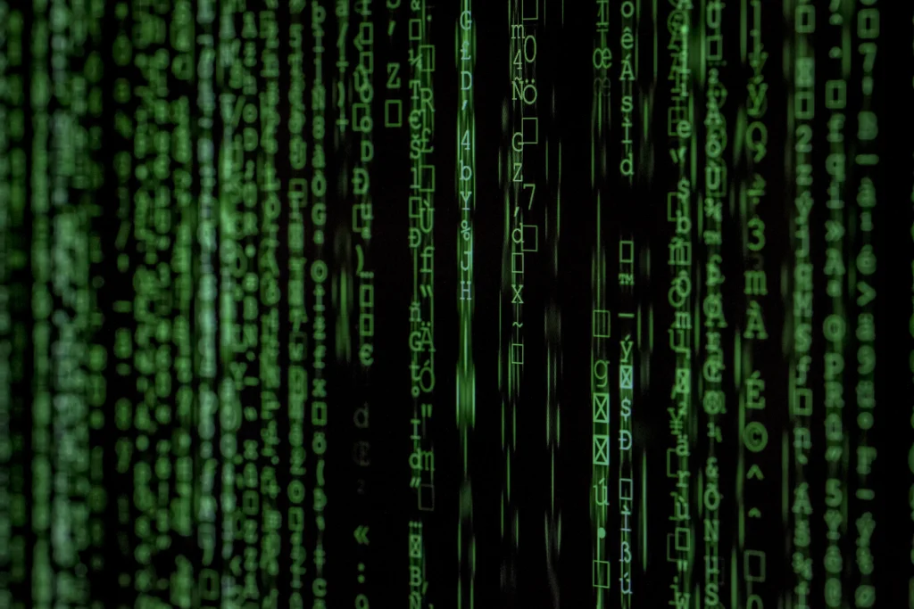 Green characters streaming down a black screen like source code
